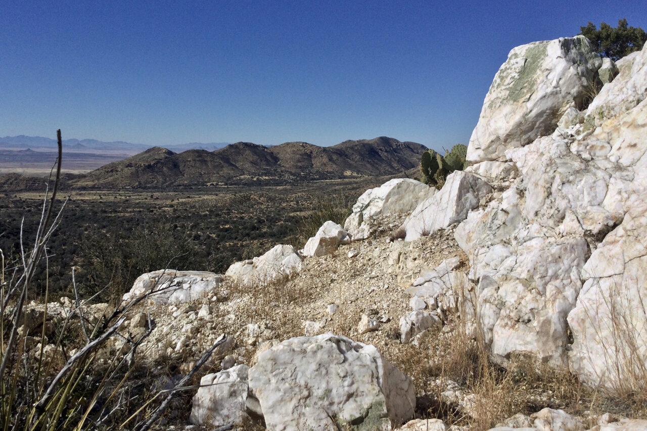 Pure white quartz outcropping at the summit of Quartz Mountain Pure white quartz outcropping at the summit of Quartz Mountain